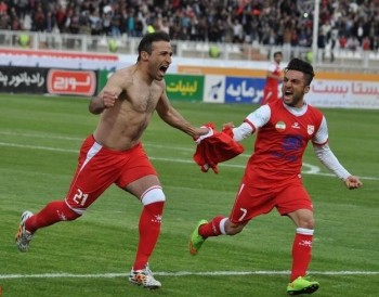 Mohsen Delir celebrates his equaliser.